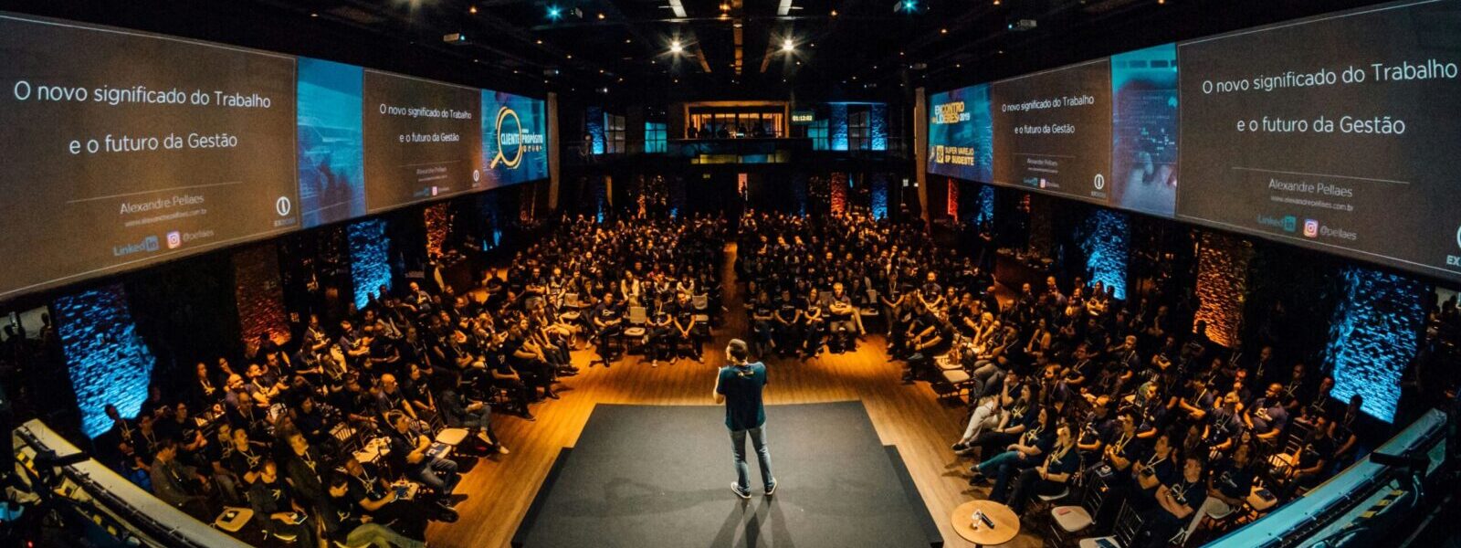 speaker in front of the poeple giving a speech