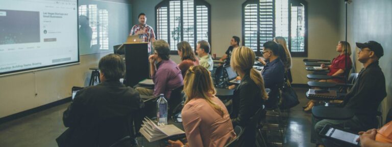 group of people sitting in the room